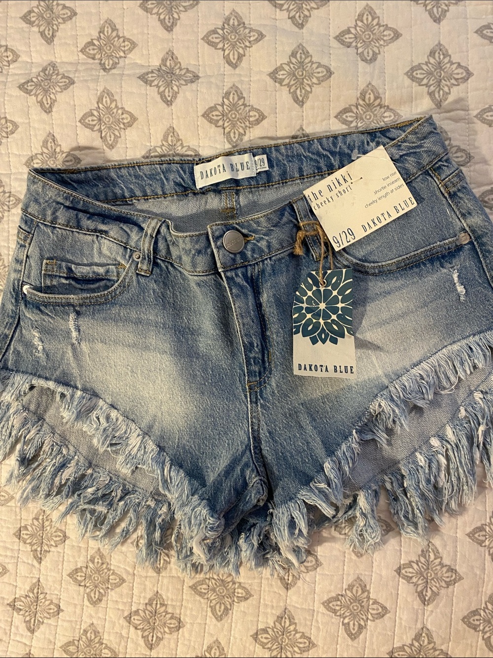 Dakota Blue Women's Light Blue Frayed Hem Denim Shorts